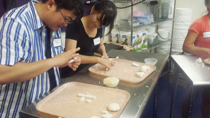 Workshop photo of people making soap